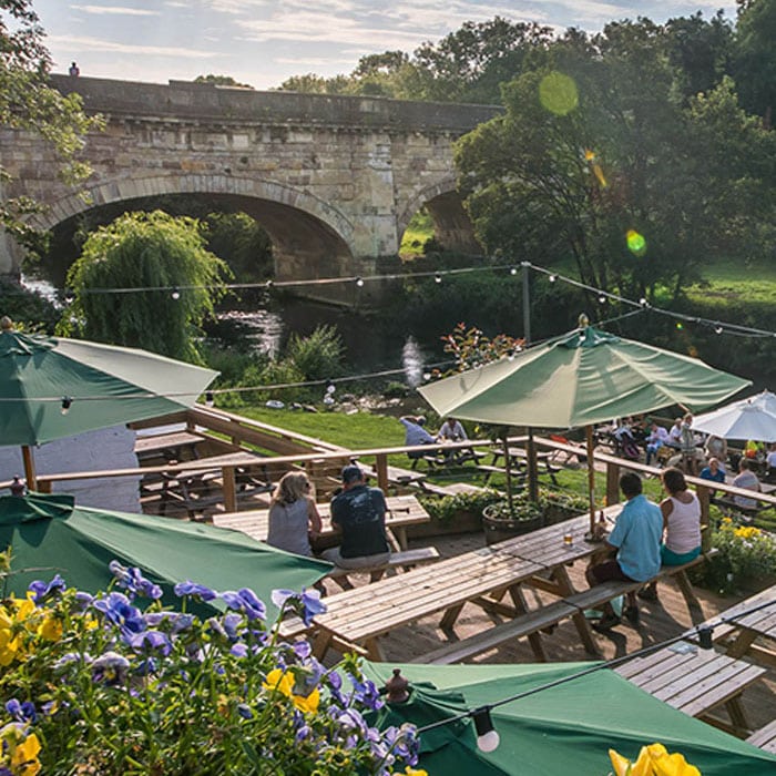 Avoncliff Aqueduct and riverside dining on the Kennet and Avon Canal Avoncliff Aqueduct and riverside dining on the Kennet and Avon Canal