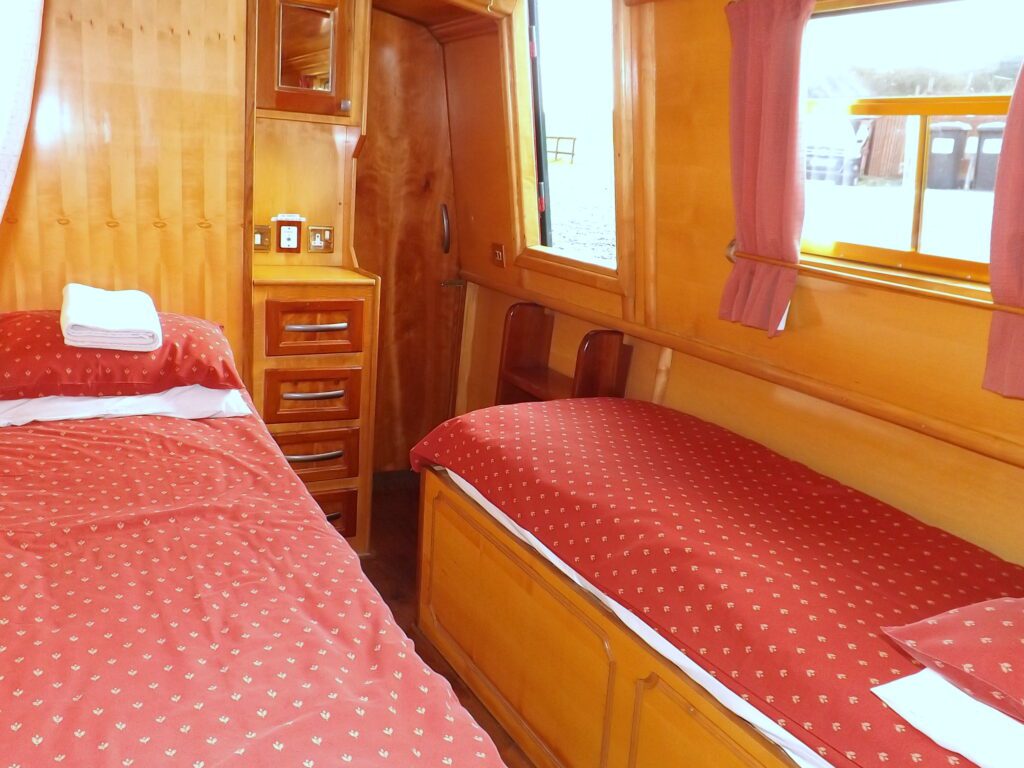 twin single beds which will also convert to a fixed double bed