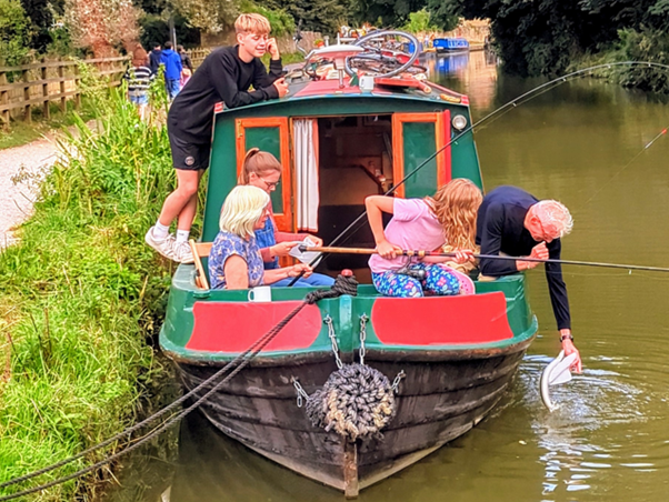 A multi generational family enjoying a Foxhangers Canal Holiday